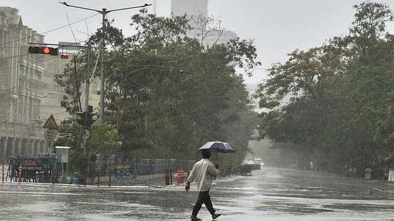 Monsoon arrives in Mumbai; IMD issues yellow alert for heavy rain; chances of drizzle in Delhi as well.