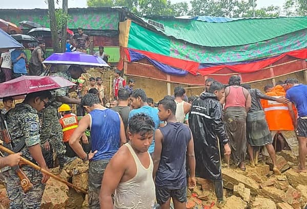 Heavy rains in Bangladesh trigger landslides; 8 killed after being buried under soil at a Rohingya camp madrasa.