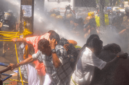 Water cannons used on Karni Sena protesters in Jaipur as demonstrators remove barricades