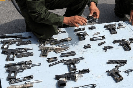 Laos tightens control over illegal weapons