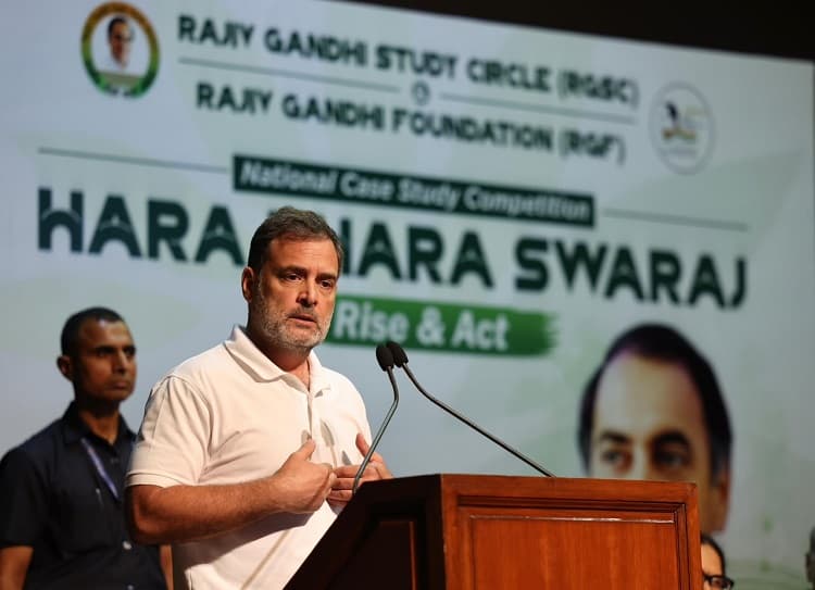 Rahul unveils the cover of Sonia's autobiography on Rajiv Gandhi's birth anniversary.