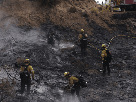 Fast-growing wildfire near US Nevada-California border injures 6, forces 42,000 to evacuate